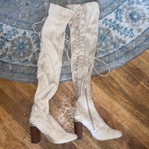 Thigh high beige lace up boots